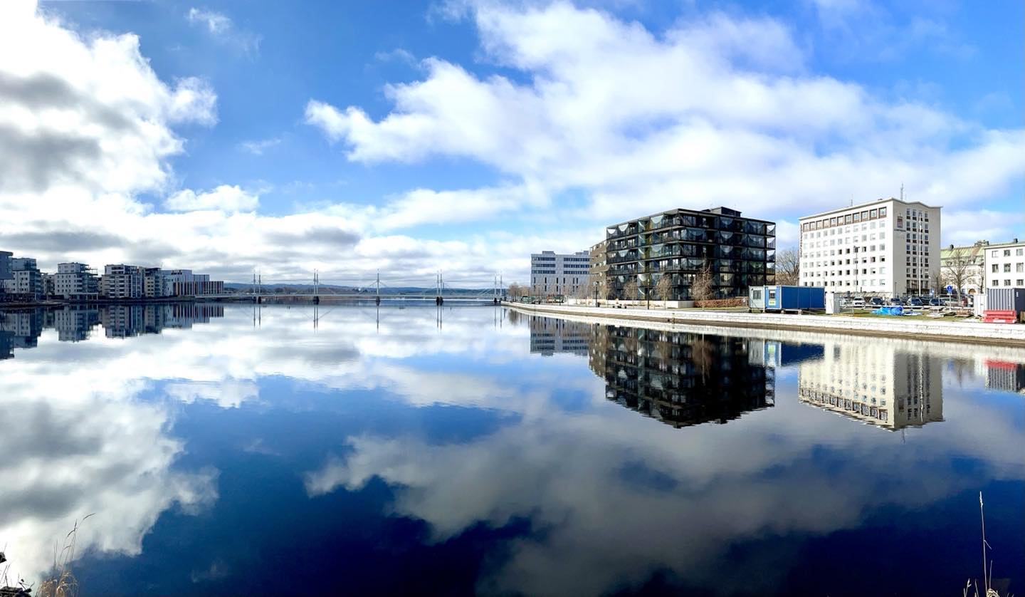 The City Holds Its Reflection